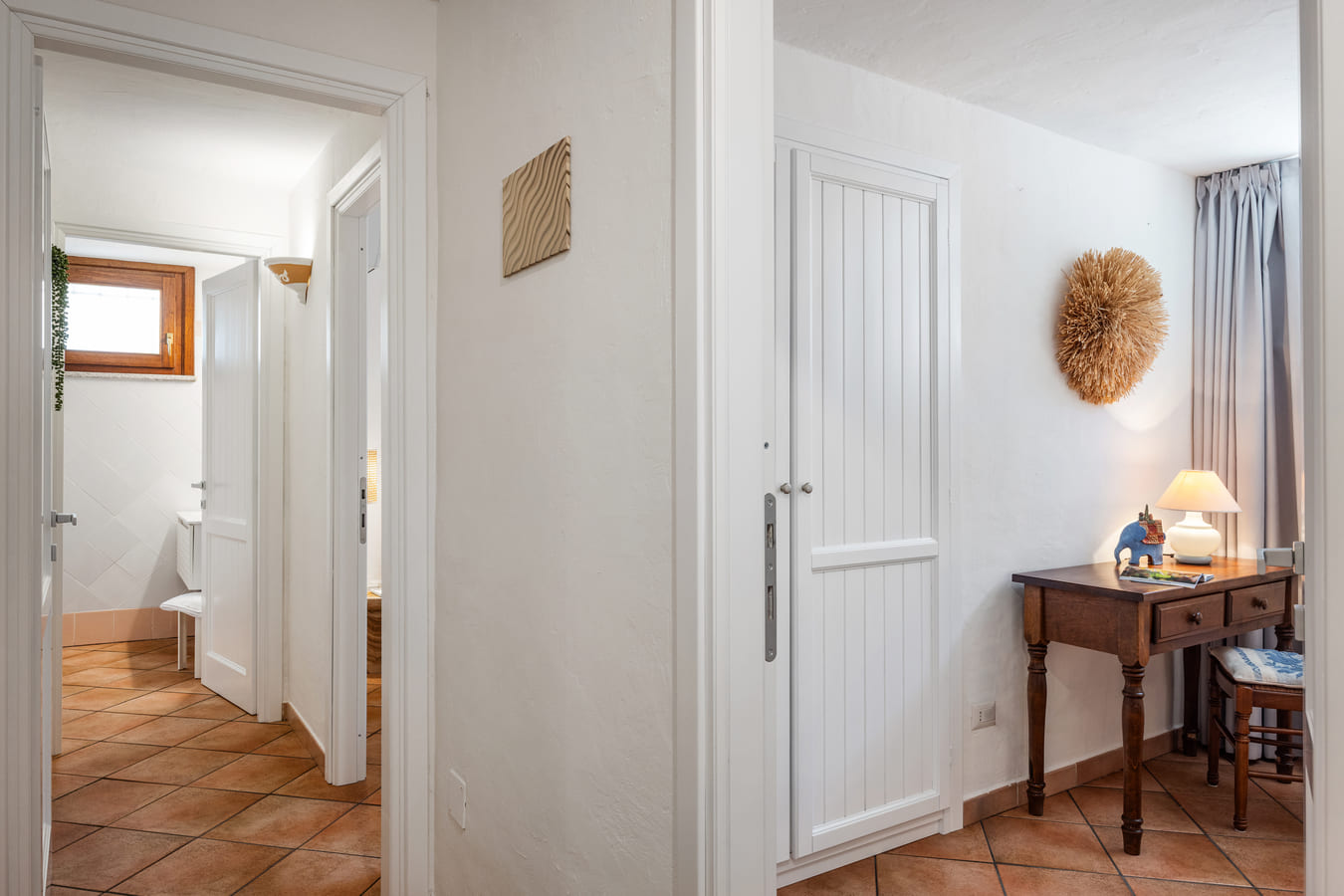 Interior corridor of the villa with bedroom doors